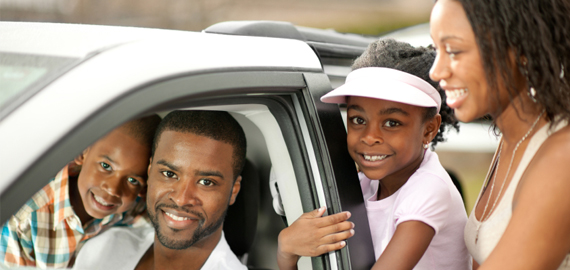 Slideshow Image of a nice family in their new car